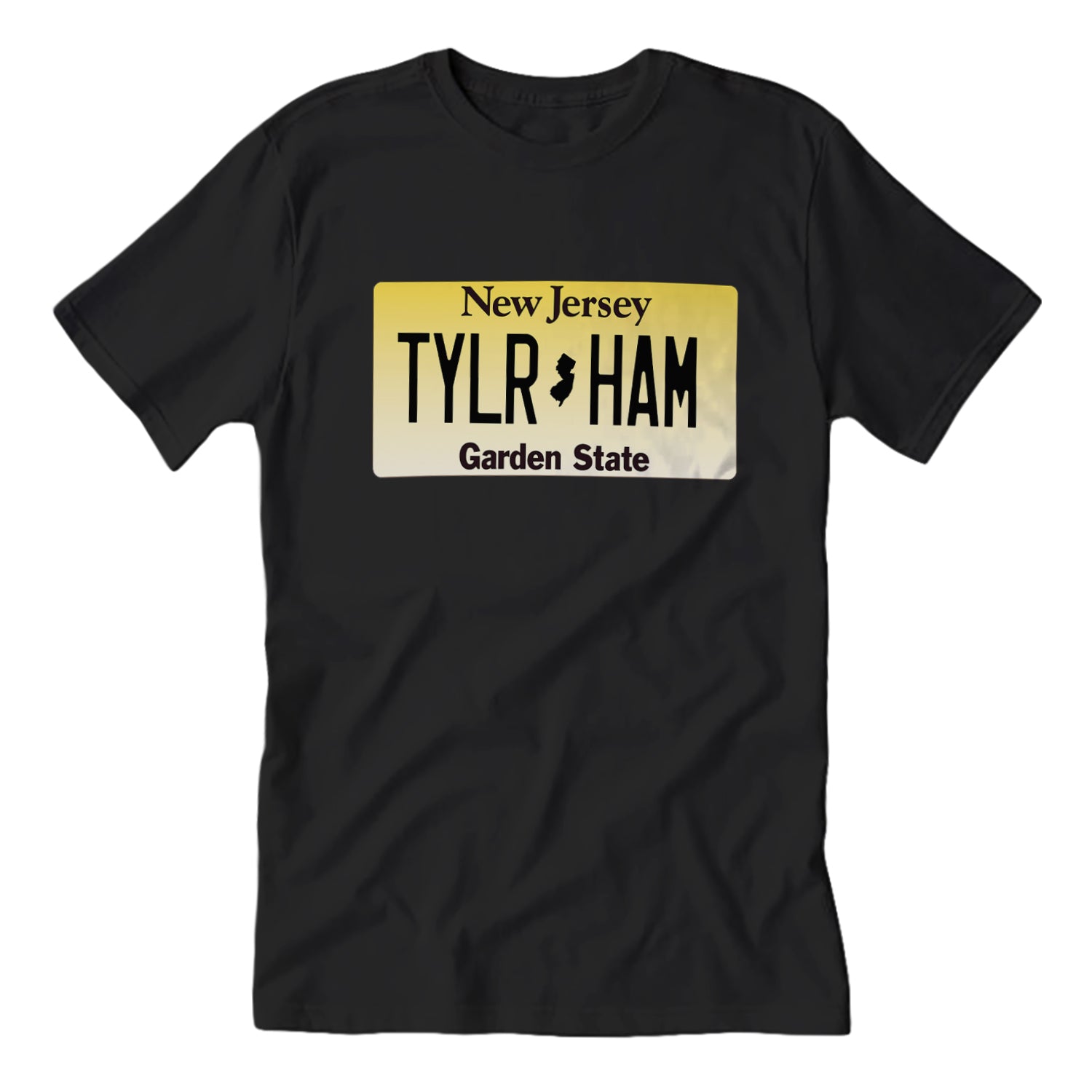 Black crew neck t-shirt with a print of a New Jersey license plate that reads 'TYLR HAM - Garden State'.